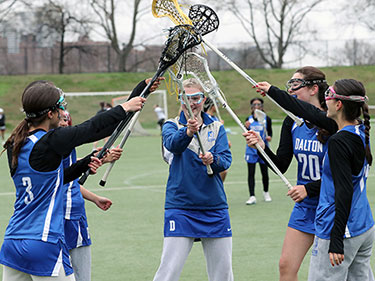 A girls lacrosse leam. Links to What to Give